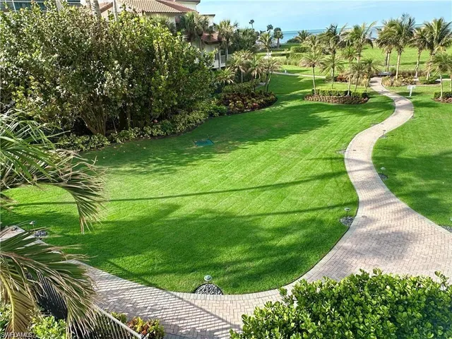 a view of a balcony with chairs