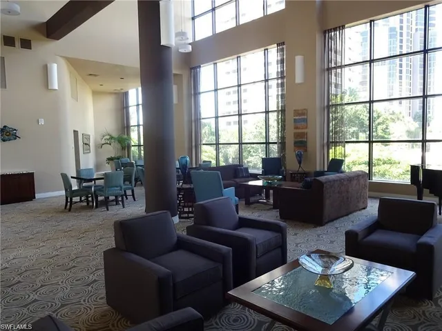 a view of an empty room with a large window