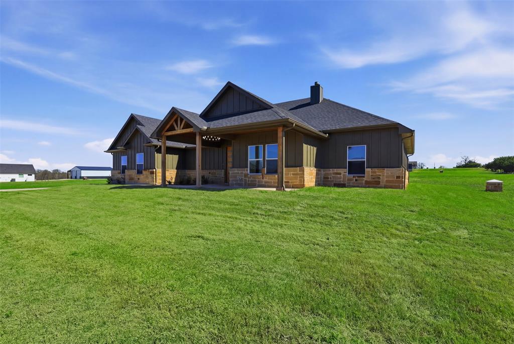 6657 Buffalo Ridge Circle Godley, TX 76044 - Photo 8 of 31 a front view of house with a garden
