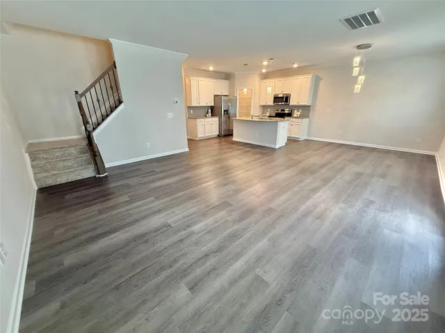 a view of kitchen and windows