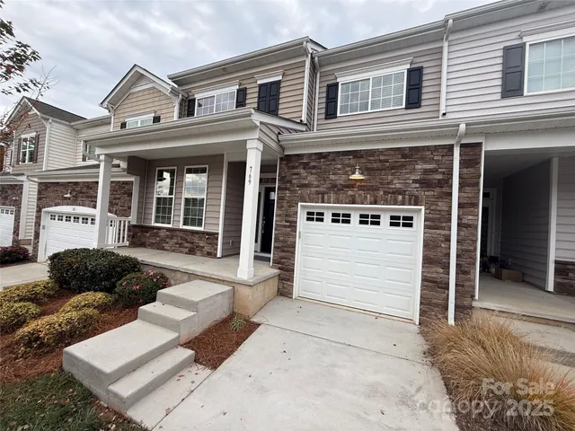front view of a house with a couch