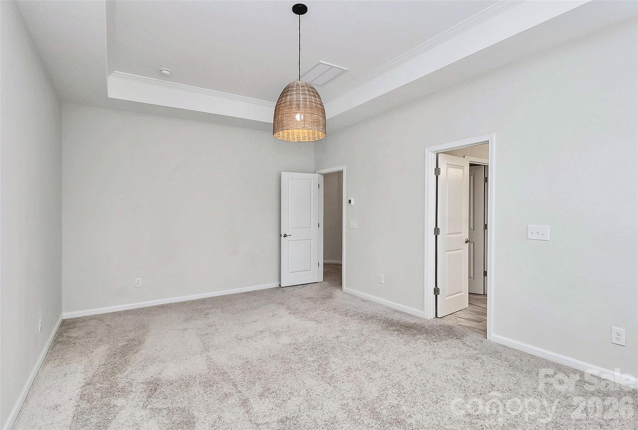 769 River Park Road Belmont, NC 28012 - Photo 24 of 41 a view of an empty room with a chandelier fan