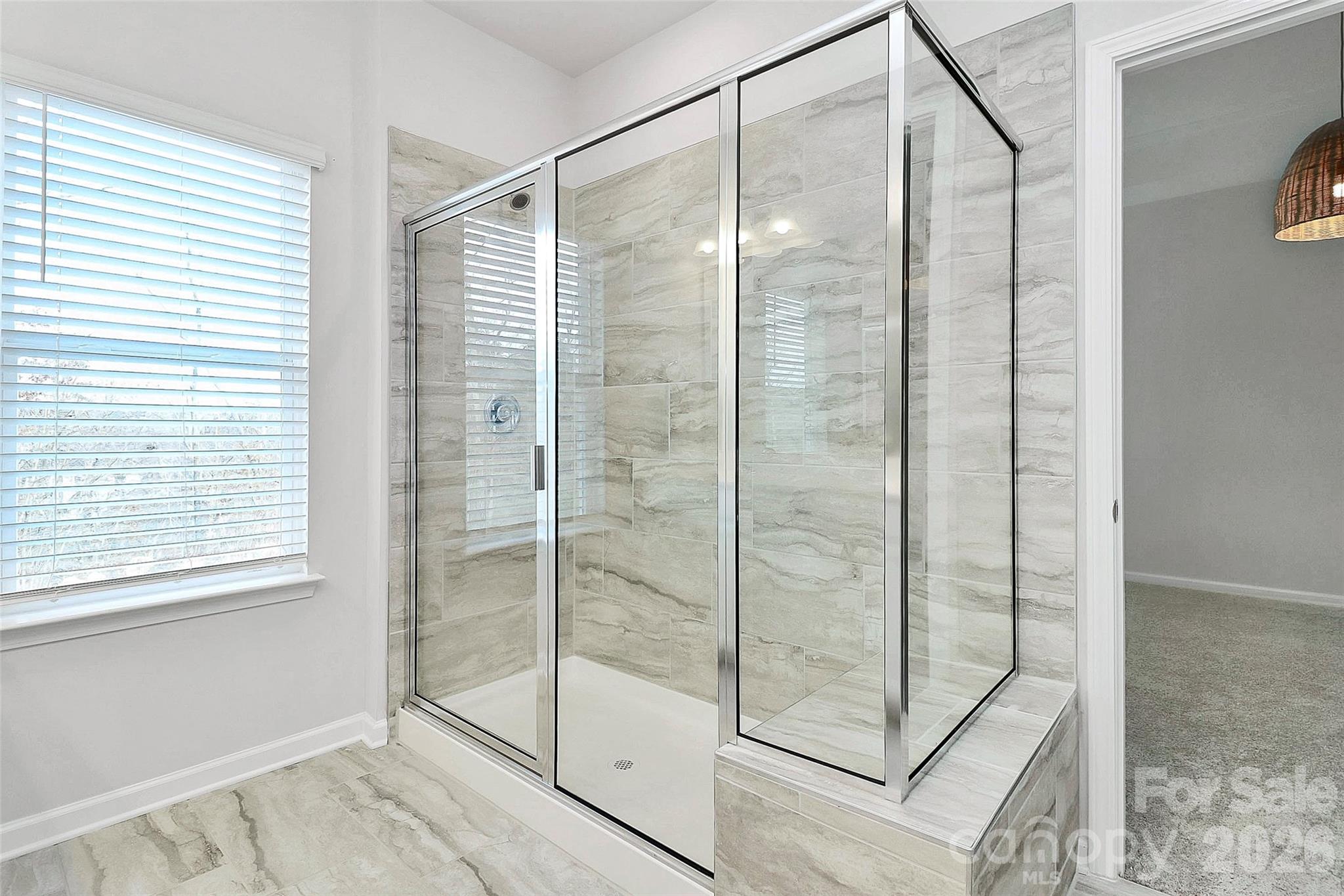 769 River Park Road Belmont, NC 28012 - Photo 26 of 41 a bathroom with a glass shower door
