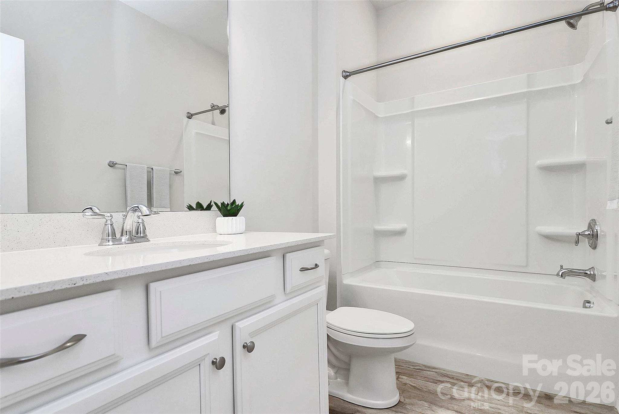 769 River Park Road Belmont, NC 28012 - Photo 29 of 41 a bathroom with a sink a toilet and a bathtub