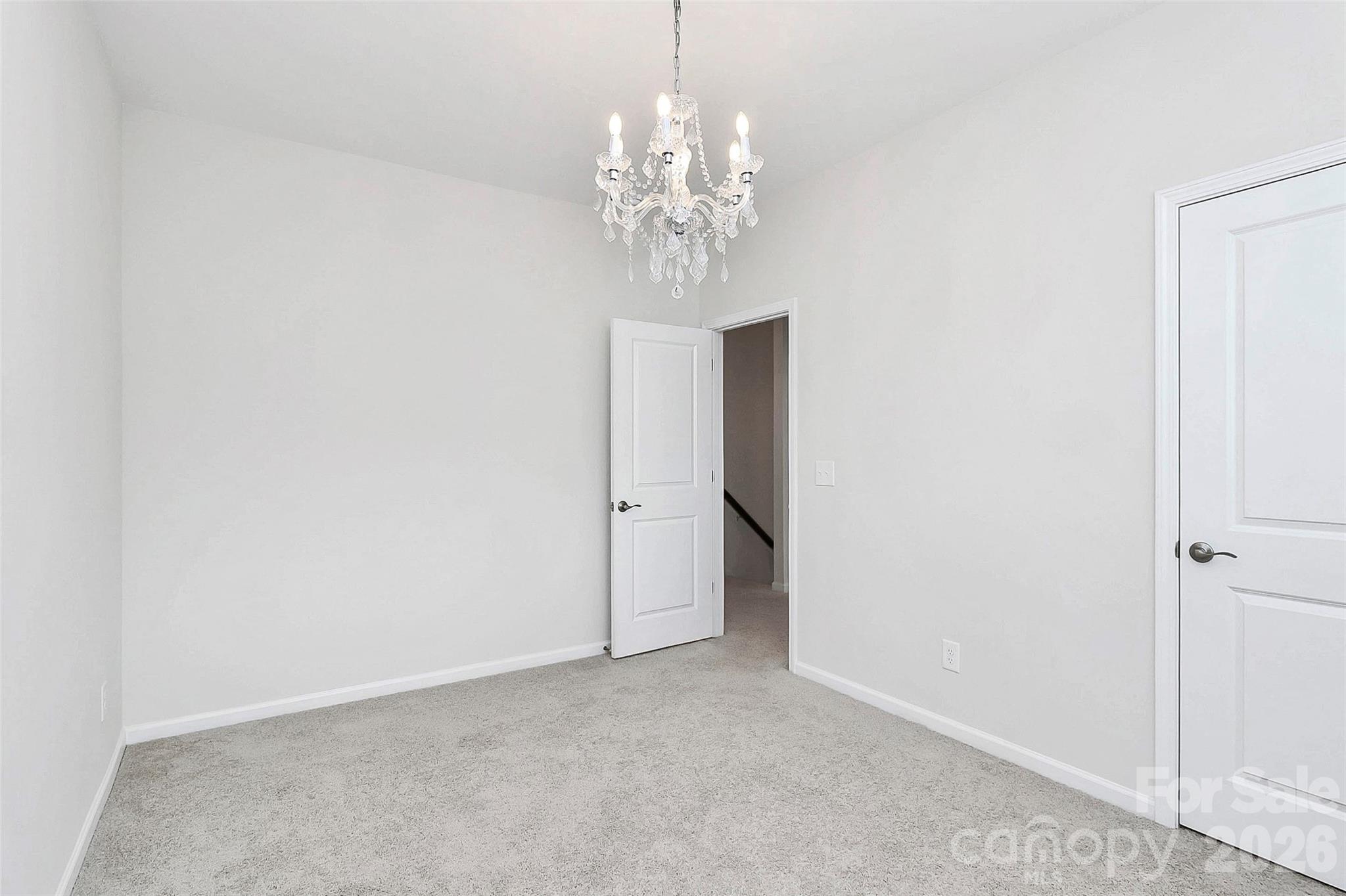 769 River Park Road Belmont, NC 28012 - Photo 30 of 41 a view of a chandelier in big room and chandelier