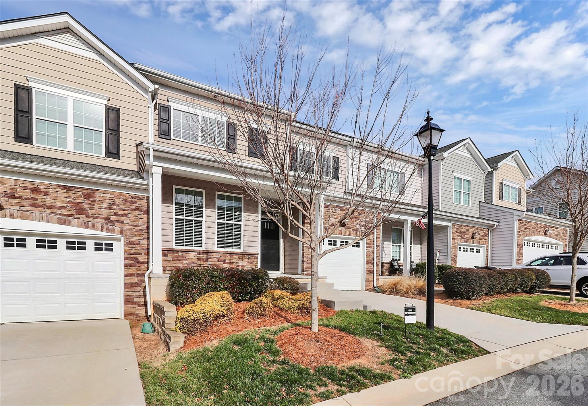 769 River Park Road Belmont, NC 28012 - Photo 3 of 41 front view of a building with a yard