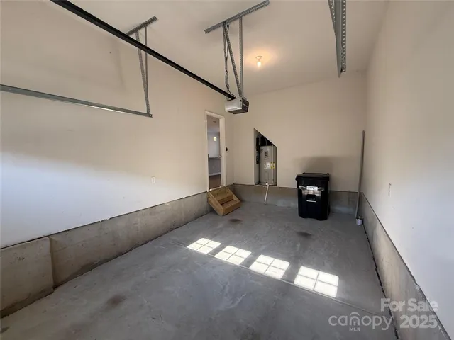 a front view of a house with a garden and patio