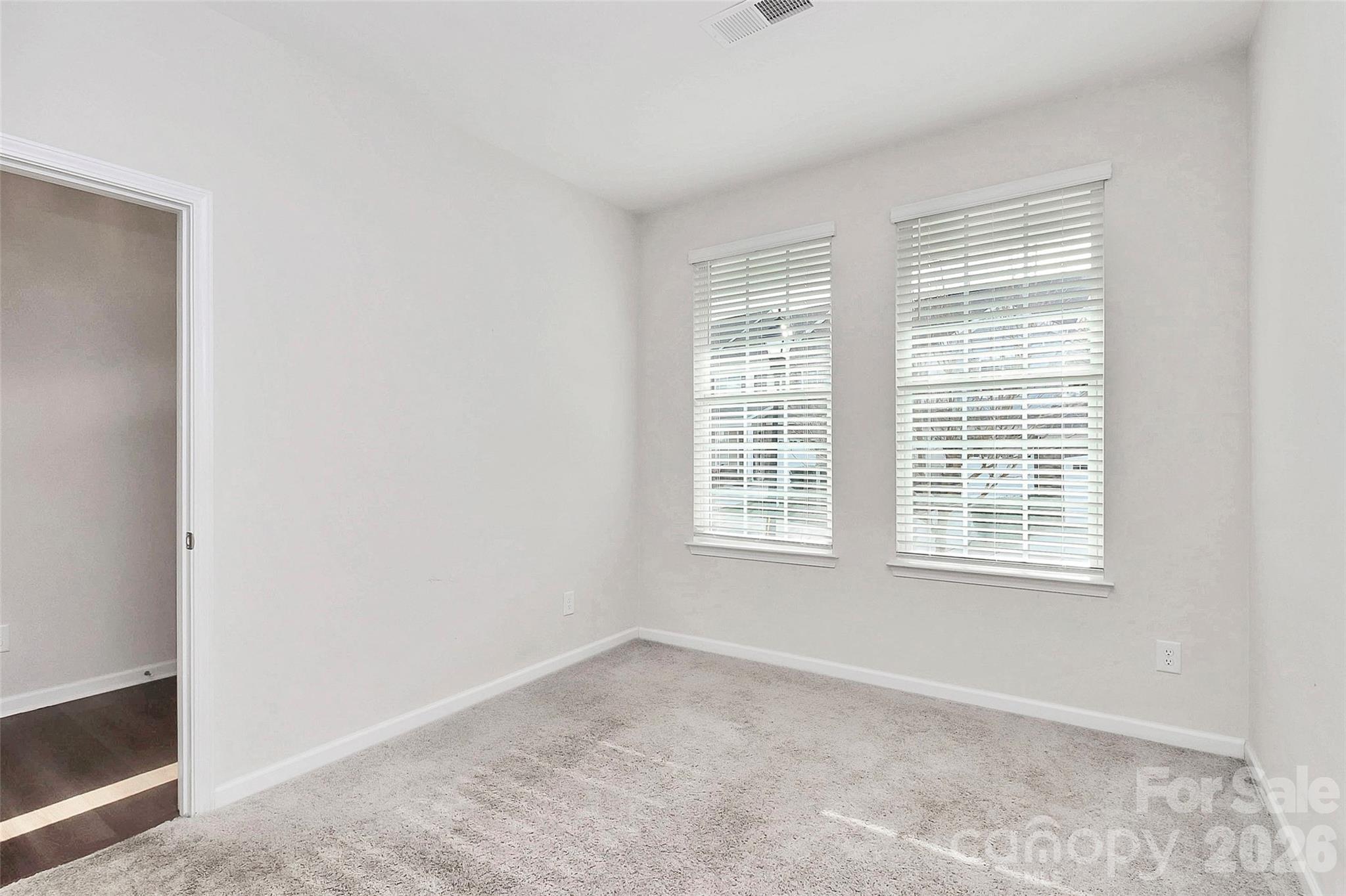 769 River Park Road Belmont, NC 28012 - Photo 5 of 41 a view of an empty room with a window