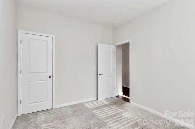 a kitchen with stainless steel appliances a refrigerator sink and microwave