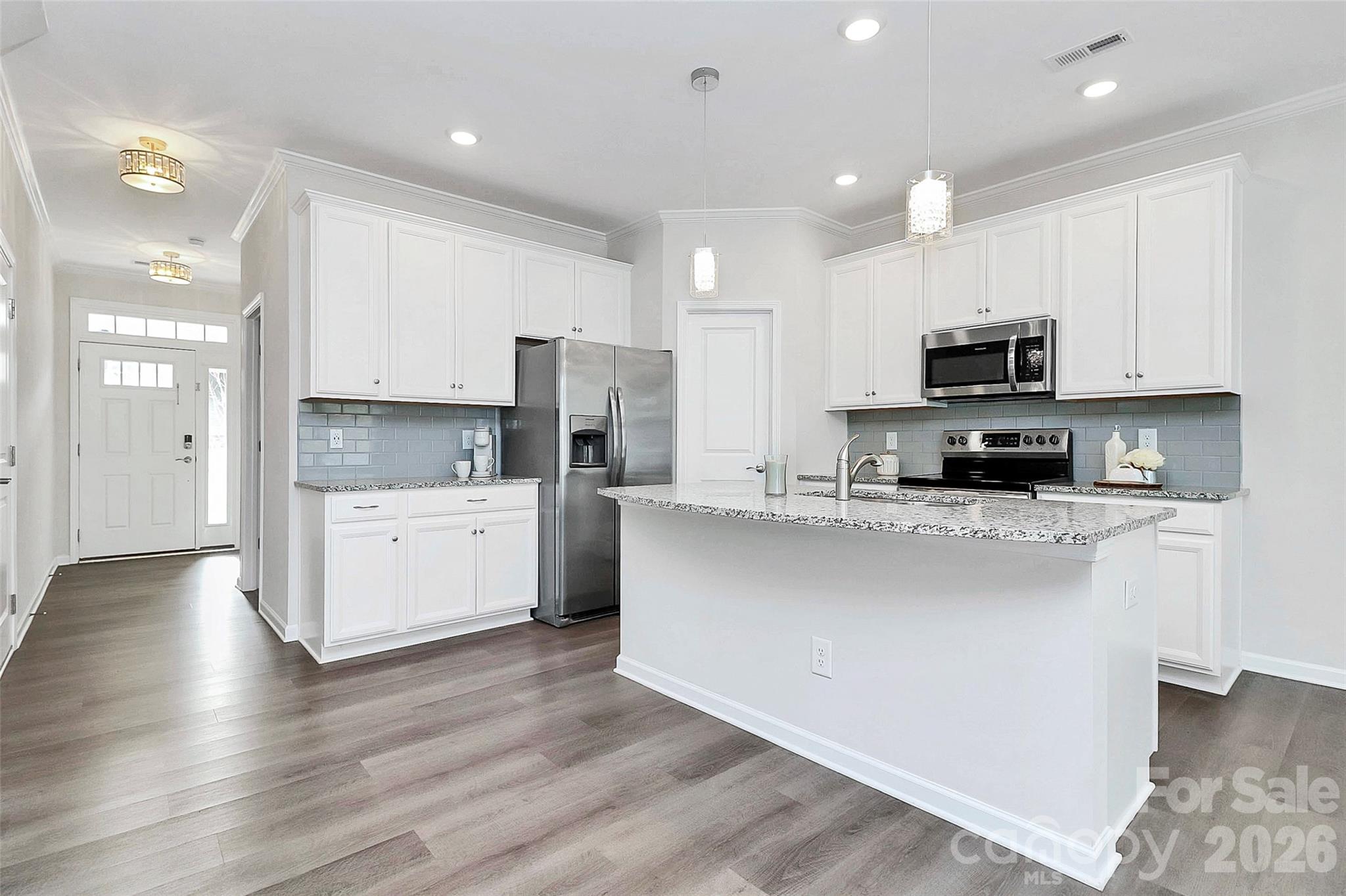 769 River Park Road Belmont, NC 28012 - Photo 9 of 41 a kitchen with stainless steel appliances a refrigerator sink and microwave