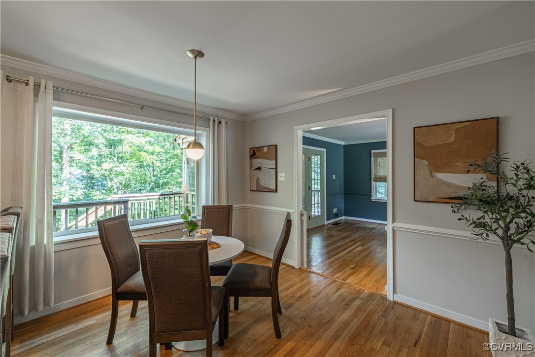 8301 Spring Meadow Road North Chesterfield, VA 23235 - Photo 13 of 50 a dining room with furniture window and wooden floor