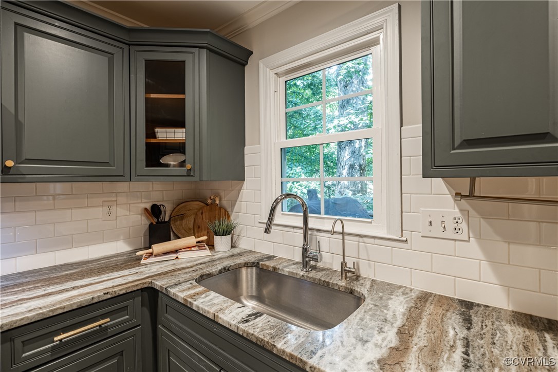 8301 Spring Meadow Road North Chesterfield, VA 23235 - Photo 20 of 50 a kitchen with granite countertop a sink and a window