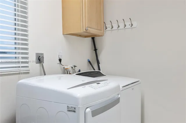 a kitchen with granite countertop a stove and a refrigerator