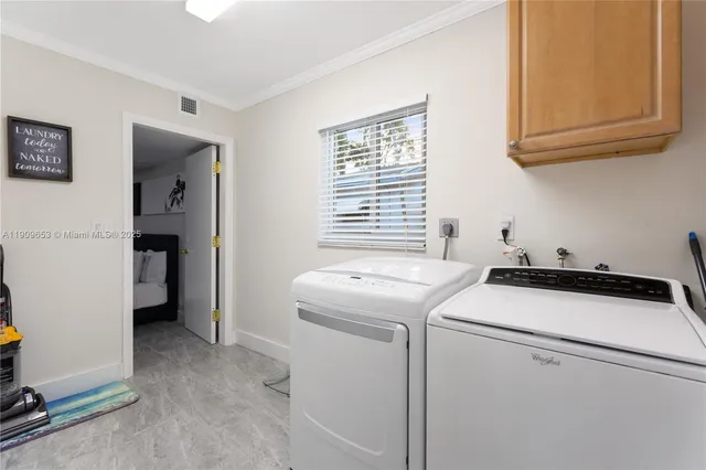 a kitchen with a sink and a window