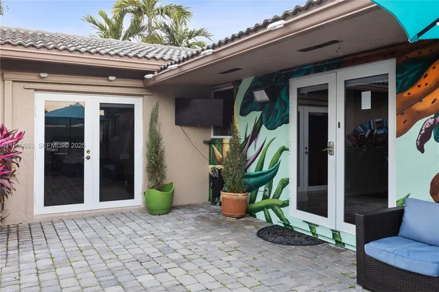 a view of a swimming pool with a patio