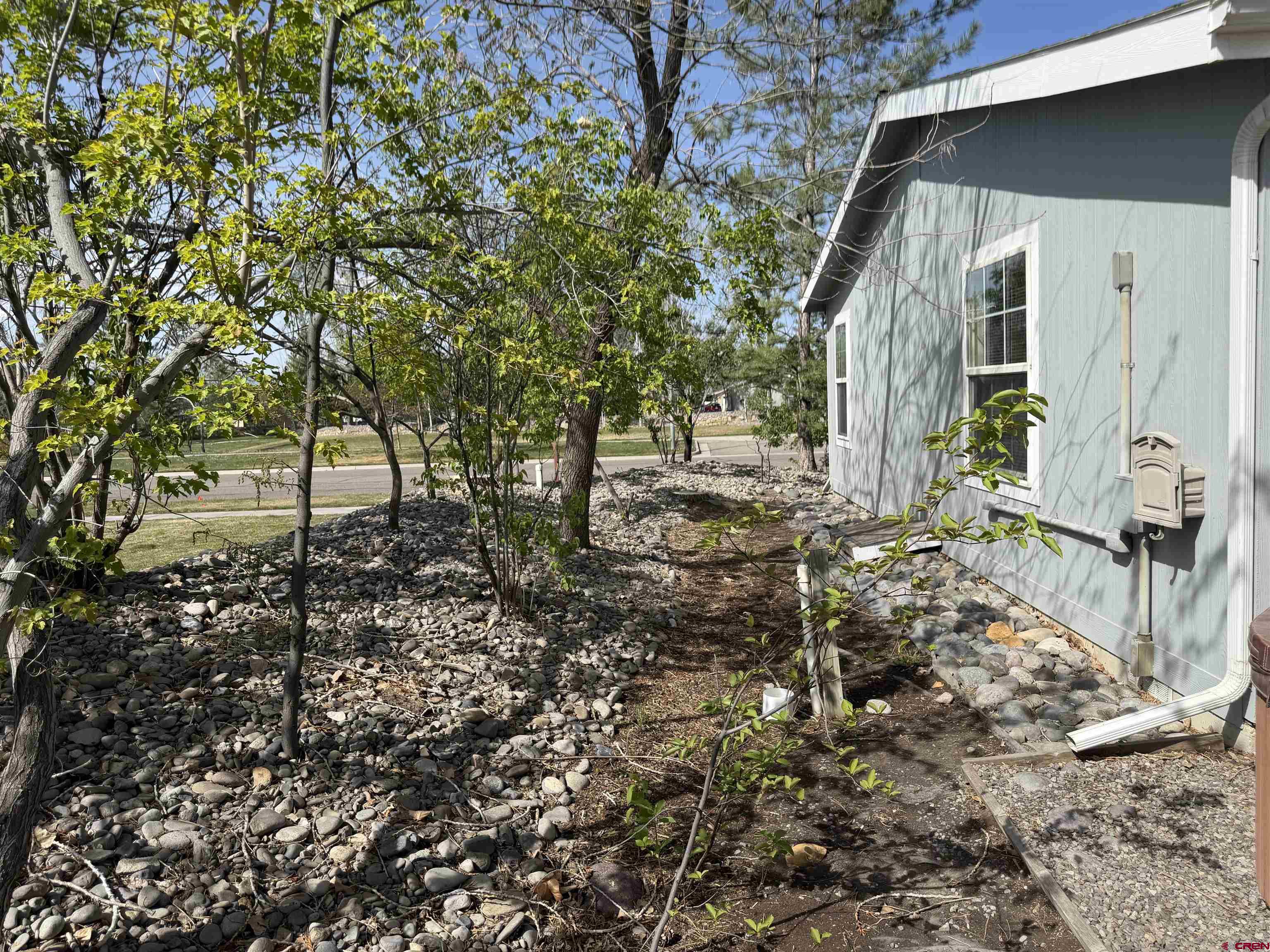 901 6530 Road, Unit 1101 Montrose, CO 81401 - Photo 11 of 45 a view of house with backyard