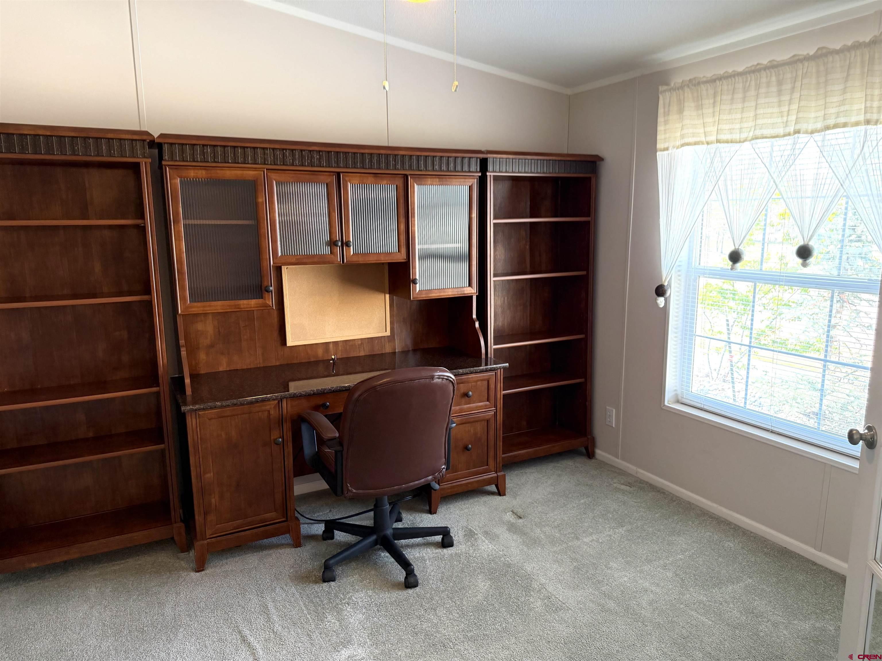 901 6530 Road, Unit 1101 Montrose, CO 81401 - Photo 16 of 45 a view of workspace with windows