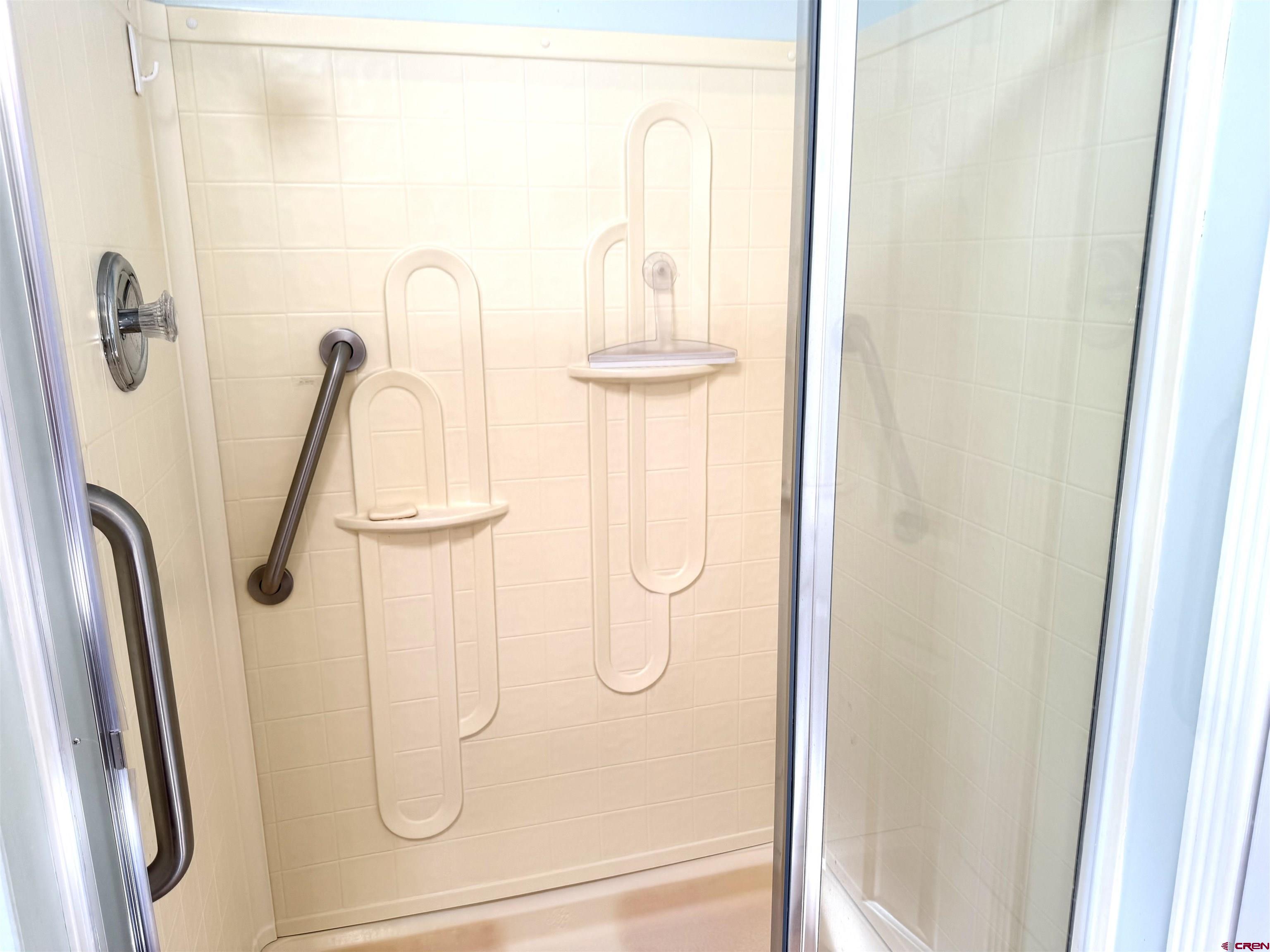 901 6530 Road, Unit 1101 Montrose, CO 81401 - Photo 21 of 45 a bathroom with a shower