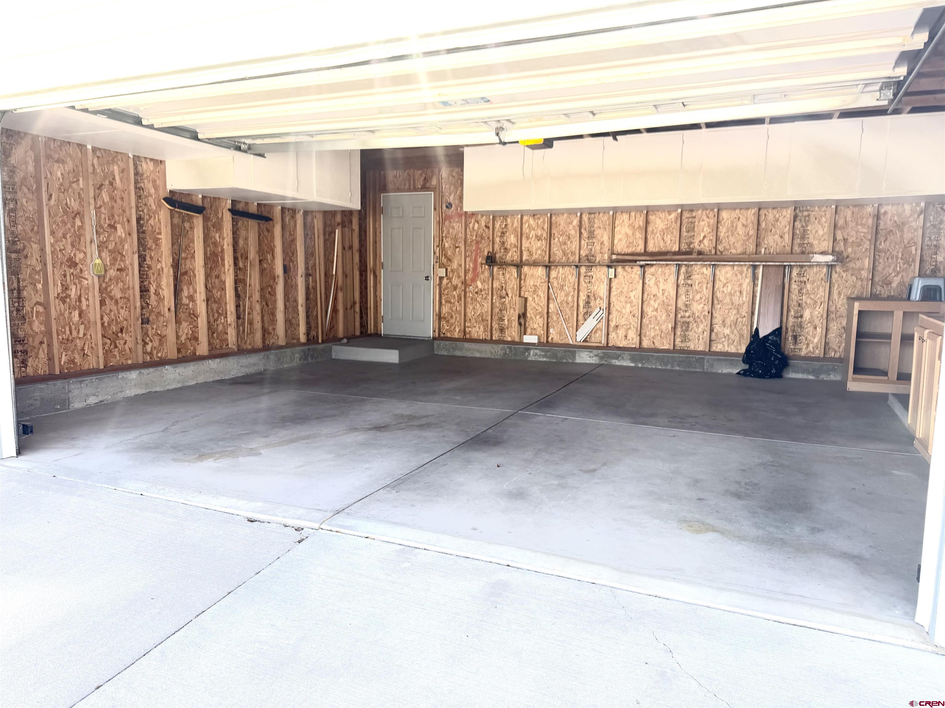 901 6530 Road, Unit 1101 Montrose, CO 81401 - Photo 7 of 45 a view of an empty room with a window