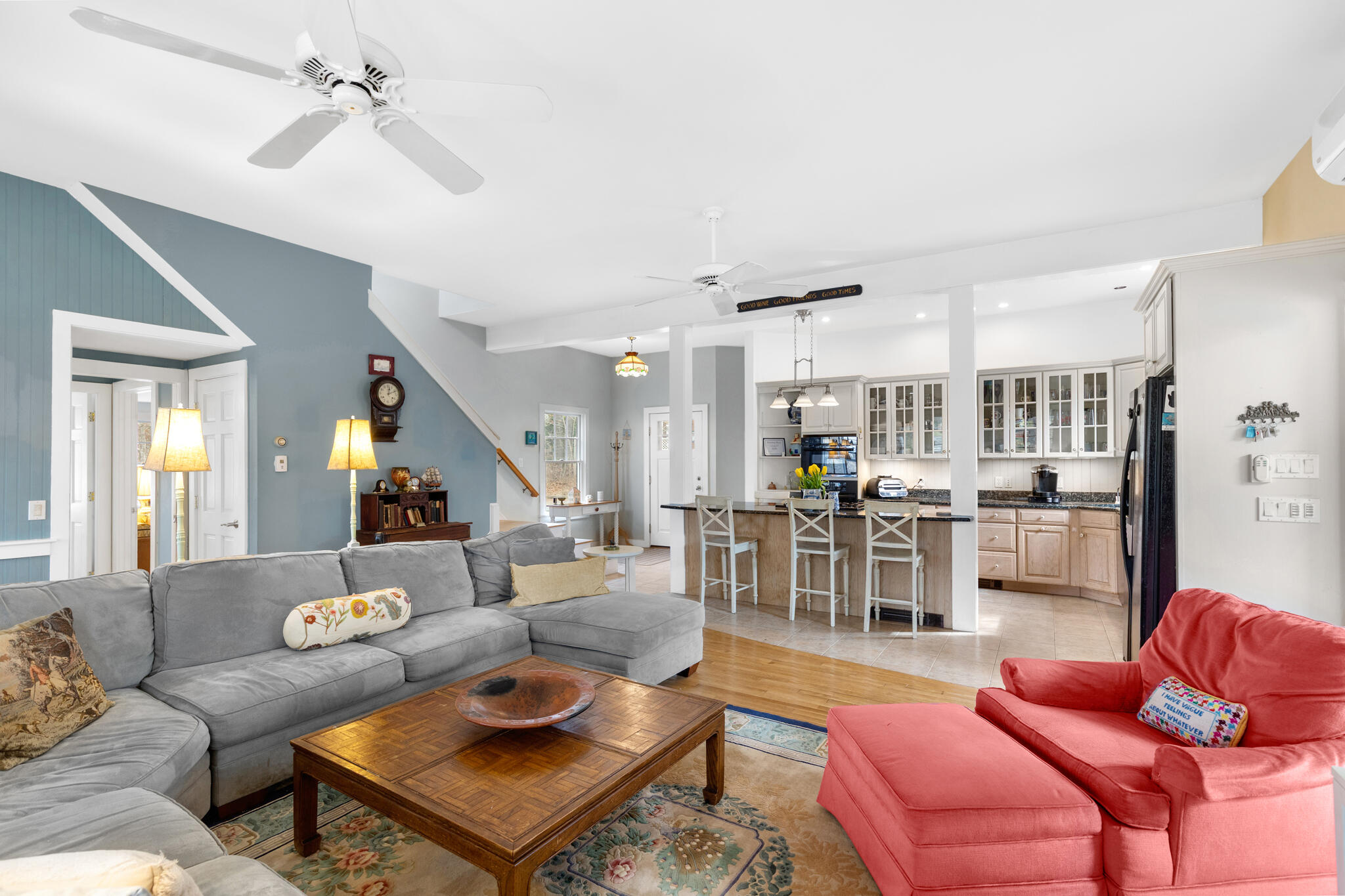 311 South Sunken Meadow Road Eastham, MA 02642 - Photo 15 of 57 a living room with furniture kitchen view and a chandelier