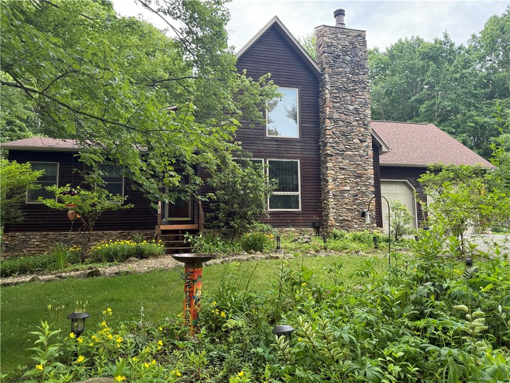 209 Modoc Trail Mercer, PA 16137 - Photo 1 of 17 a backyard of a house with lots of green space