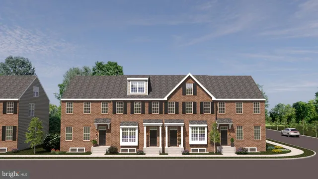 front view of a house with a small yard