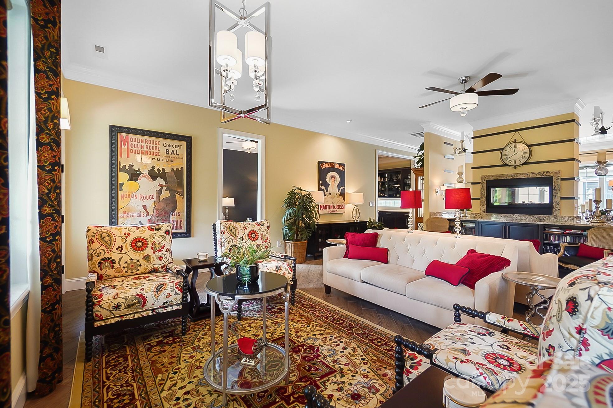2354 Valelake Road York, SC 29745 - Photo 14 of 48 a living room with lots of furniture and a chandelier
