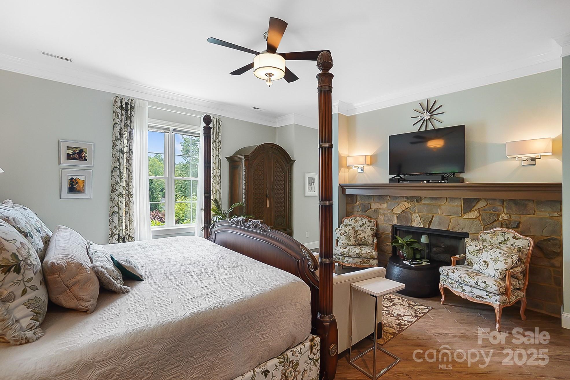 2354 Valelake Road York, SC 29745 - Photo 19 of 48 a bedroom with a bed and a fireplace