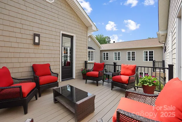 a outdoor living space with furniture and a potted plant