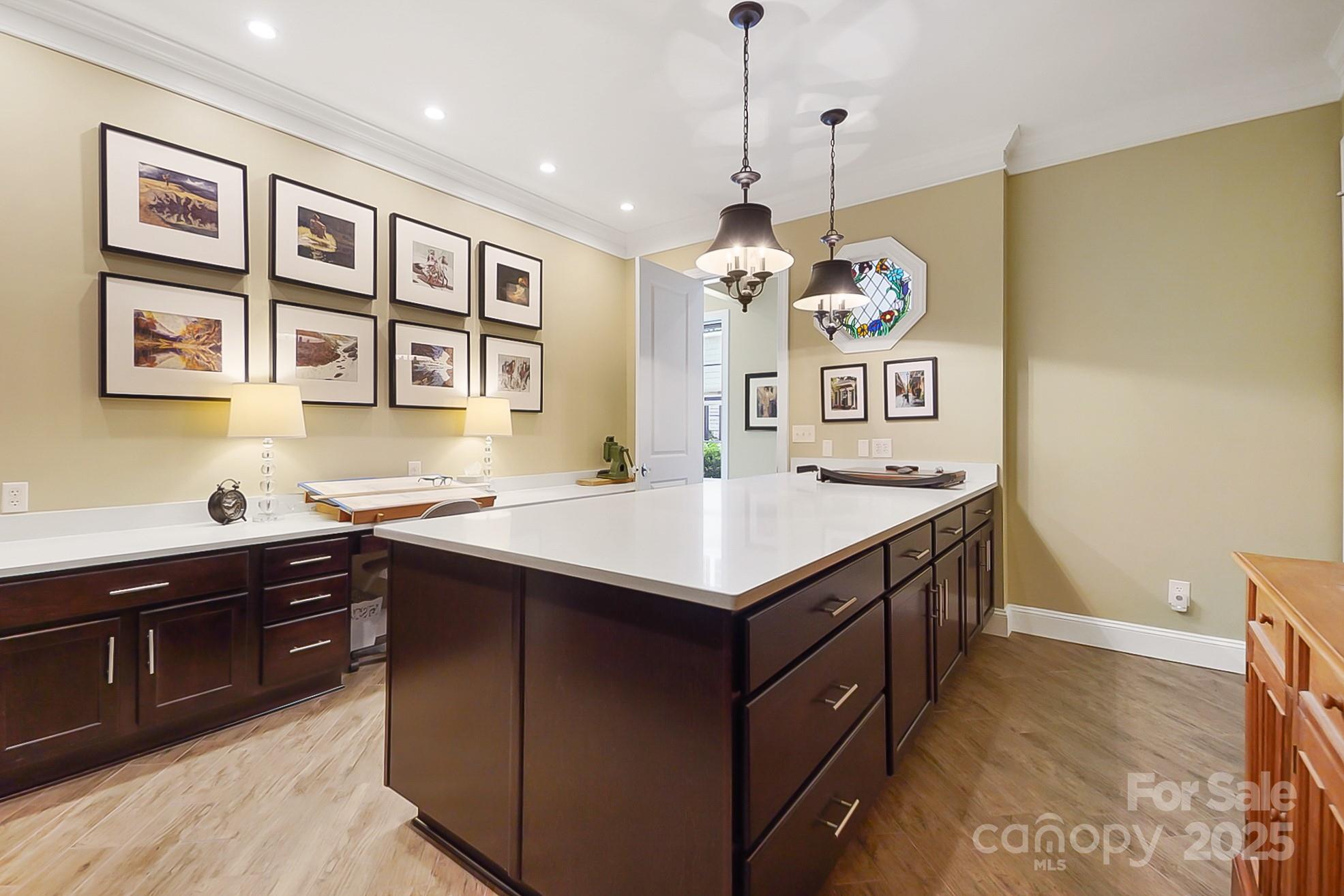 2354 Valelake Road York, SC 29745 - Photo 30 of 48 a kitchen that has a center island and some stove in it
