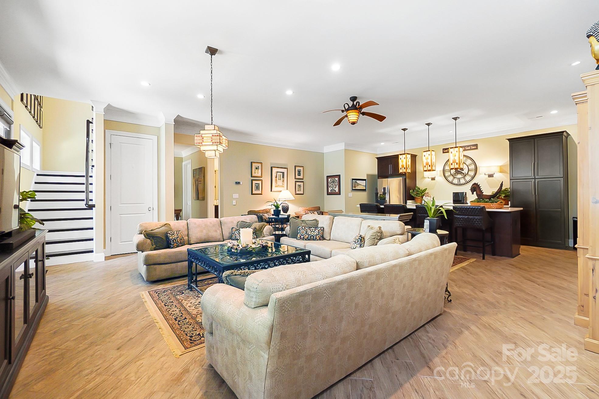 2354 Valelake Road York, SC 29745 - Photo 34 of 48 a living room with furniture dining area and a chandelier