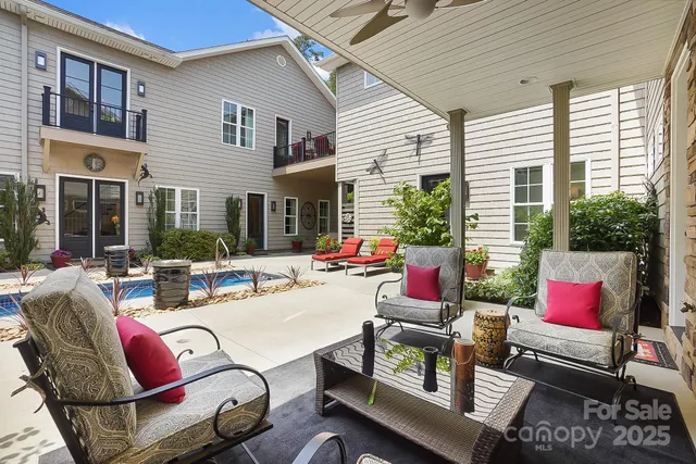 a outdoor space with patio couches and a potted plant
