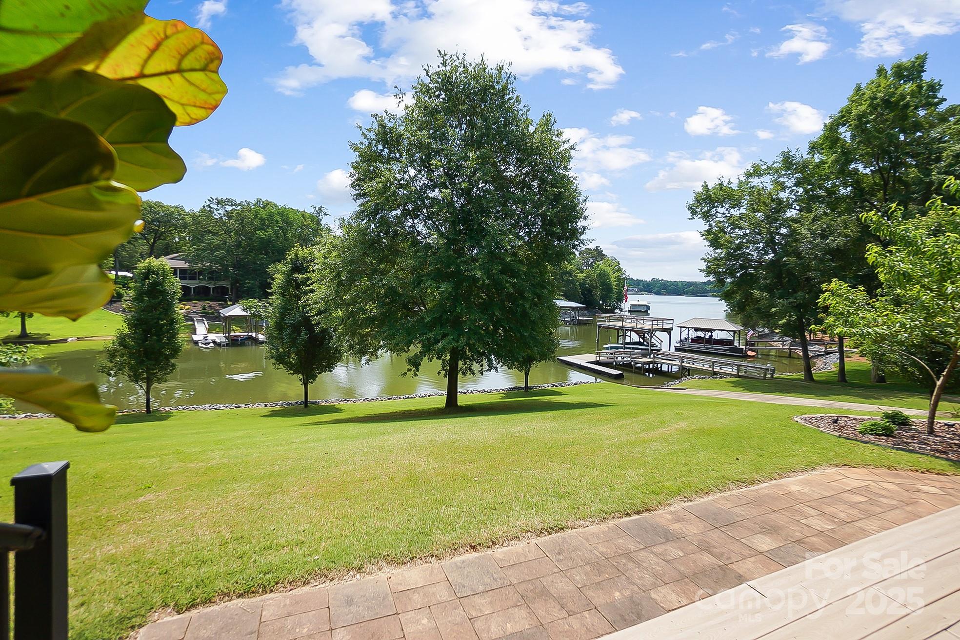2354 Valelake Road York, SC 29745 - Photo 39 of 48 a house view with swimming pool and trees in the background
