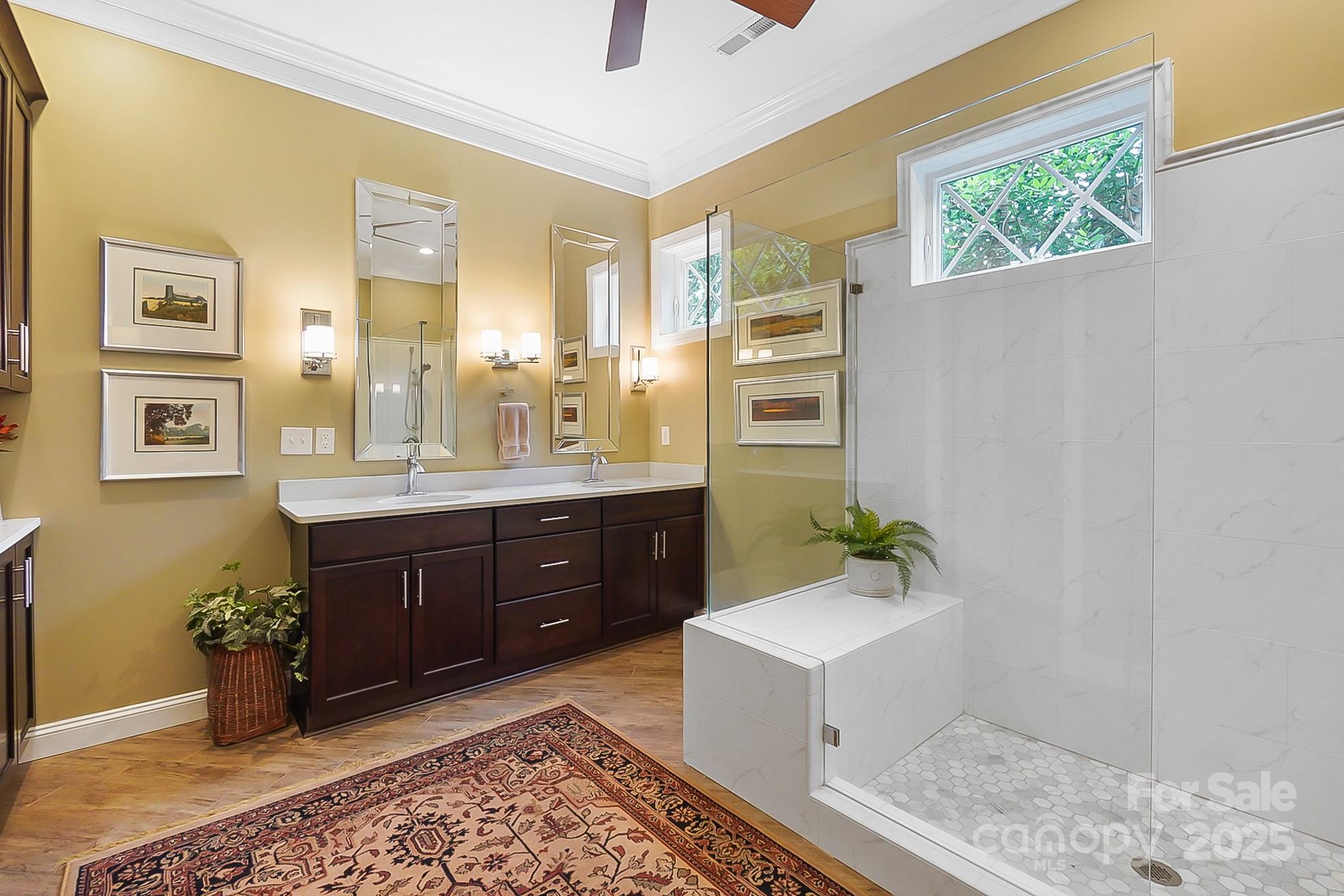 2354 Valelake Road York, SC 29745 - Photo 41 of 48 a spacious bathroom with a granite countertop sink and a mirror