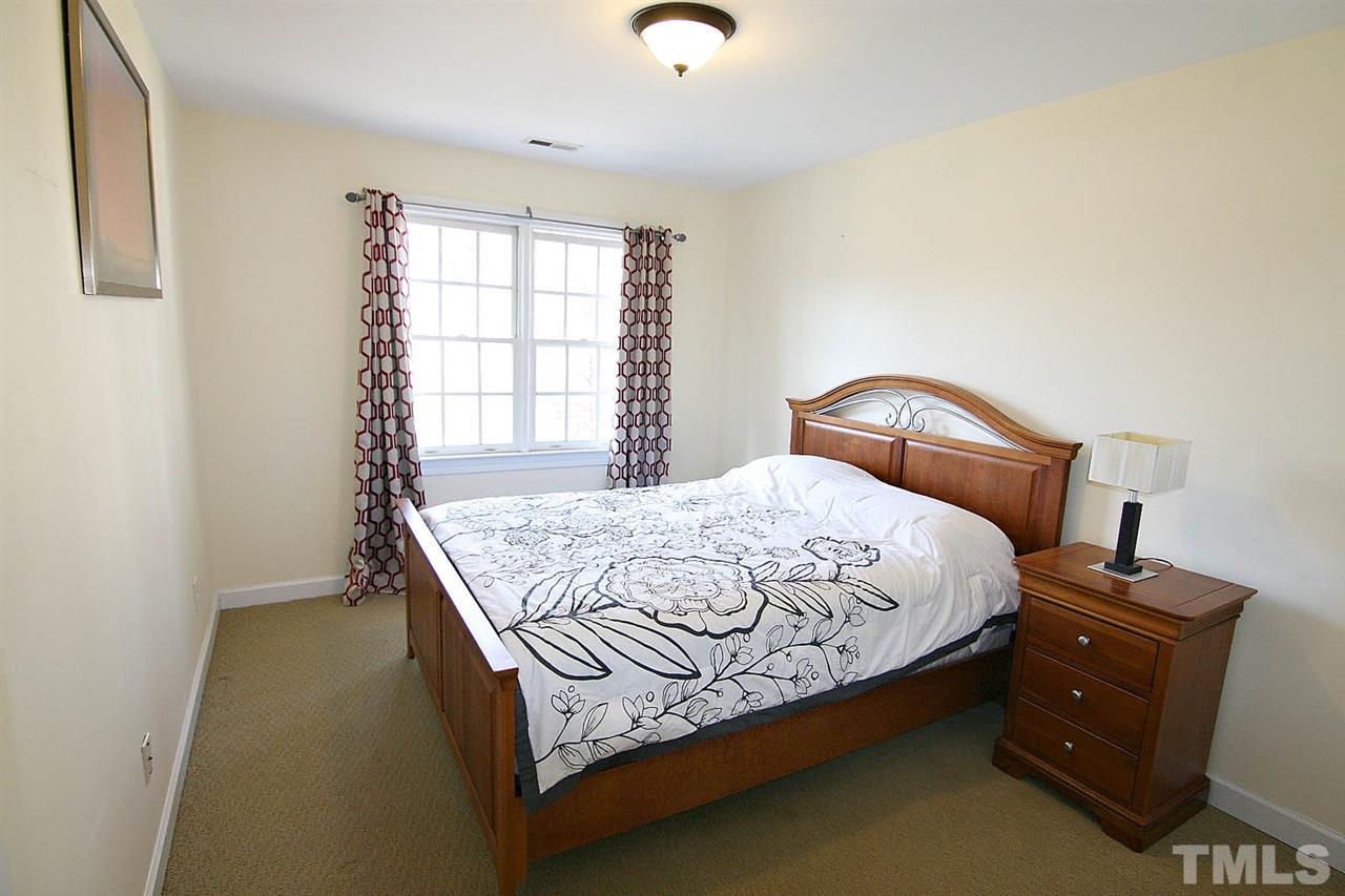 7608 Percy Court Raleigh, NC 27613 - Photo 19 of 25 Secondary Bedroom has Double Closet