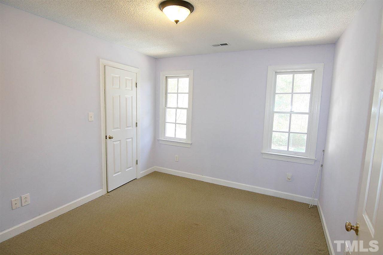 7608 Percy Court Raleigh, NC 27613 - Photo 21 of 25 Secondary Bedroom has Lighted Walk-in closet