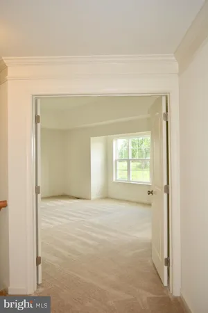 a white bath tub sitting next to a window