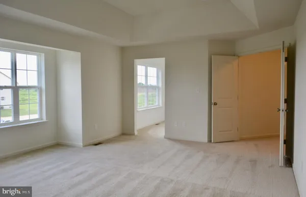 a view of a room that has a window