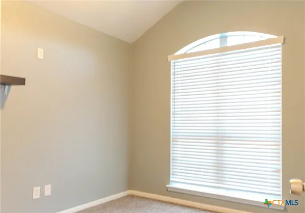 a view of a small space with a window