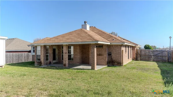a view of a house with garden