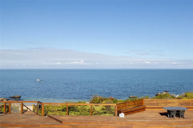 a view of a swimming pool and an ocean view