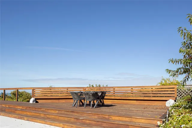 a view of swimming pool with seating space