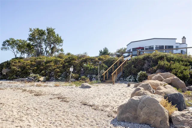 a view of a yard covered in snow
