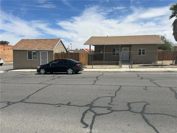 a car parked in front of a house