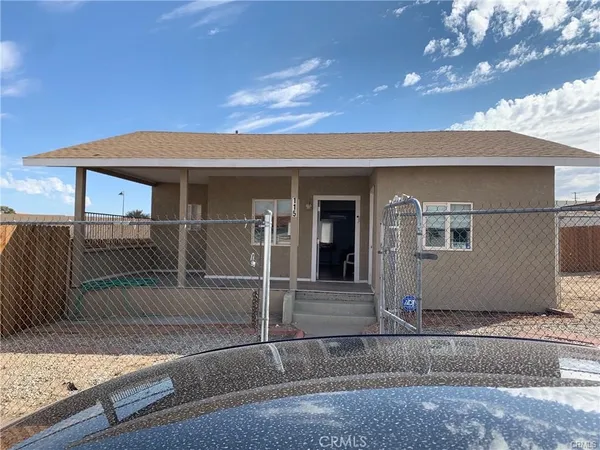 a view of a house with a patio