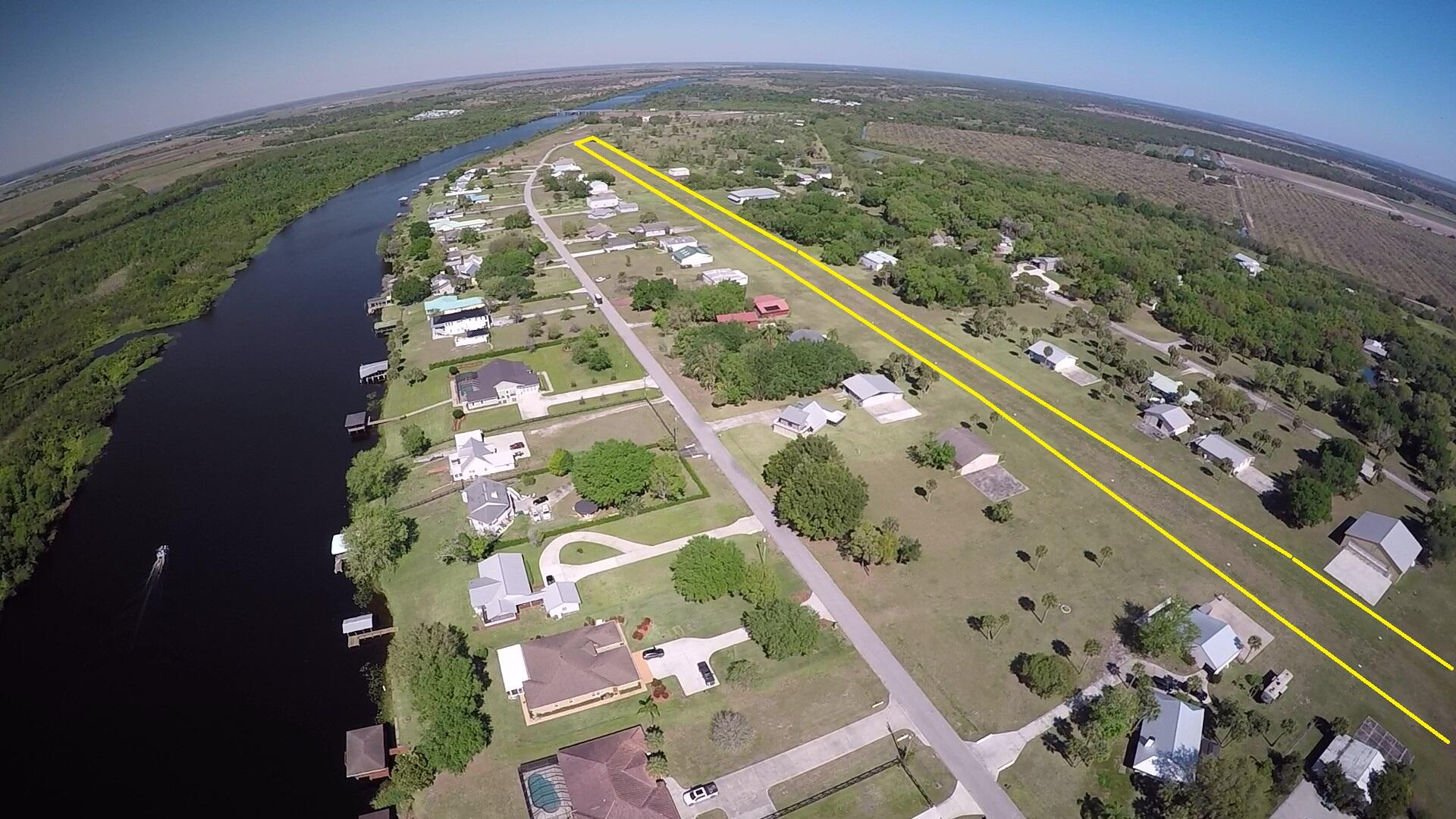13578 Southwest 144th Parkway Okeechobee, FL 34974 - Photo 20 of 21 an aerial view of a city