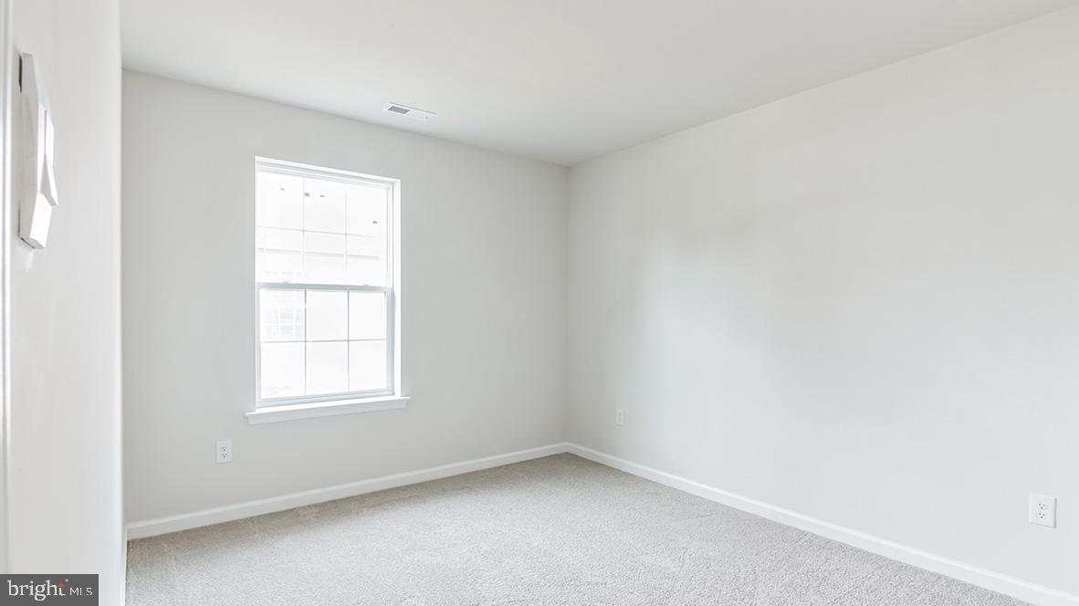 313 Vero Road Egg Harbor Township, NJ 08234 - Photo 14 of 14 an empty room with a window