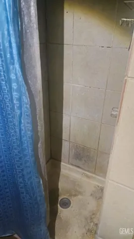 a bathroom with a toilet and a sink