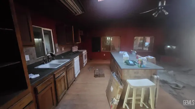 a view of a hallway with entryway to windows