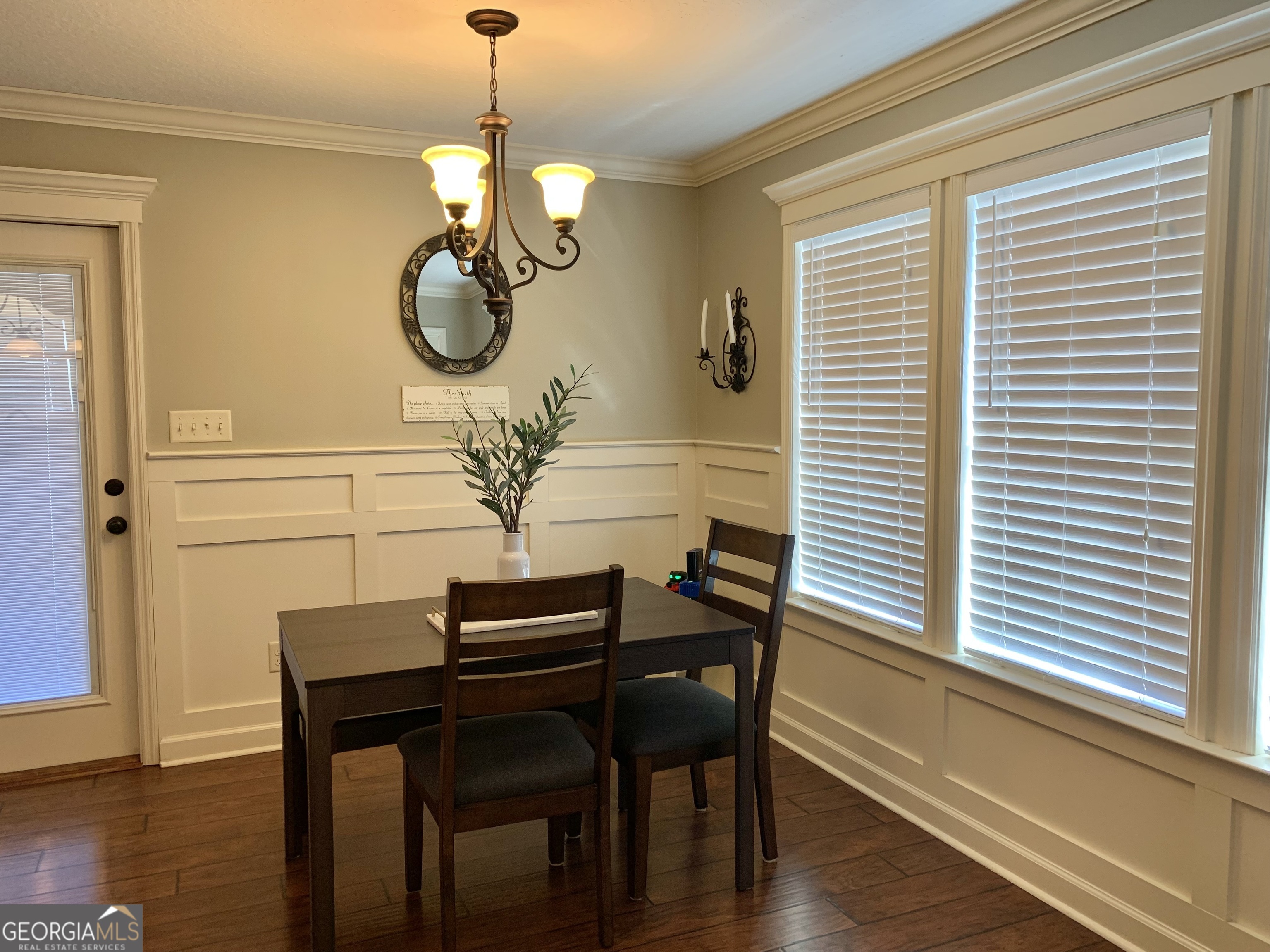 4192 Bright Creek Road Hahira, GA 31632 - Photo 15 of 28 a view of a dining room with furniture window and wooden floor